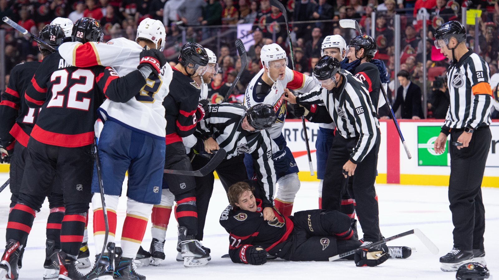 Oct 21, 2026; Florida Panthers center Sam Bennett (9) takes a penalty for slashing following a scuffle between left wing Brady Tkachuk and Ottawa Senators center Ridly Greig (71) in the second period at the Canadian Tire Centre.